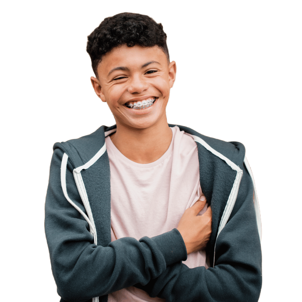 Teen with braces smiling confidently, demonstrating effective and personalized orthodontic solutions for adolescents.