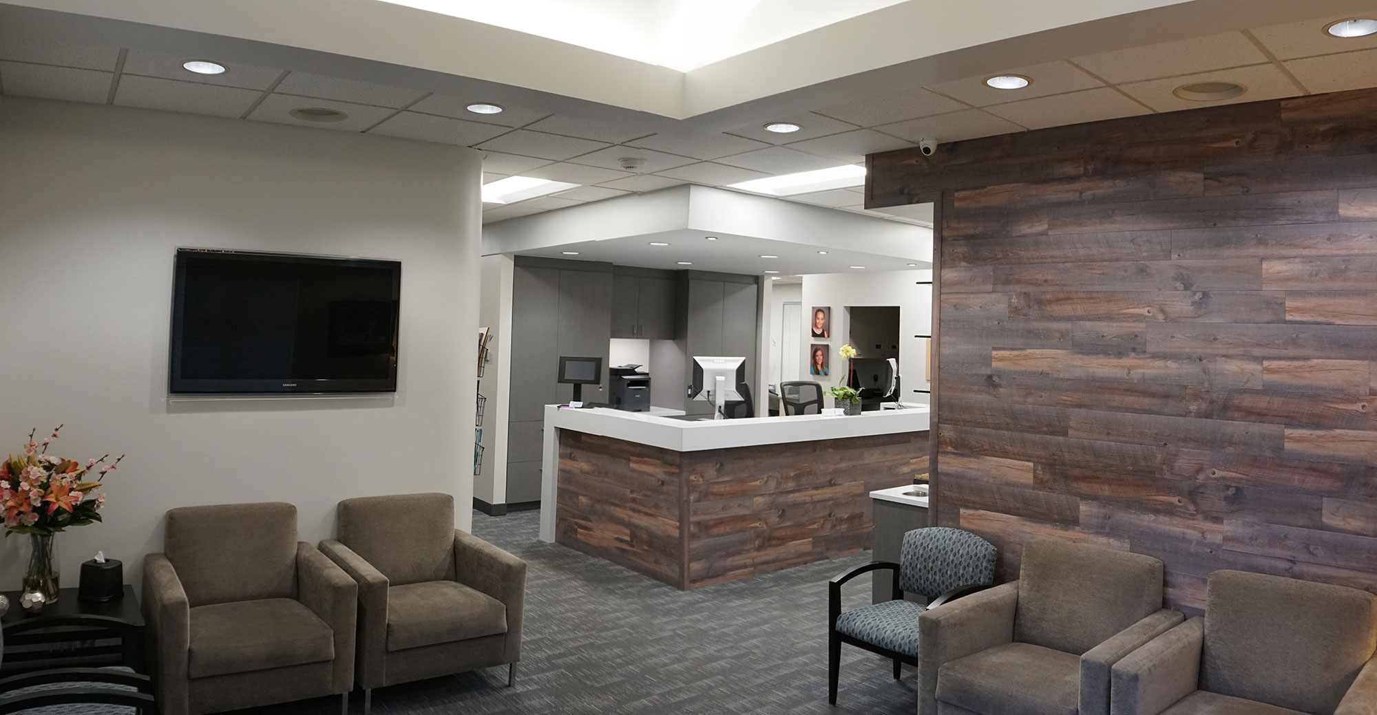 Reception area of our orthodontic office with modern furnishings, creating a calm and professional environment where patients are greeted with a smile.